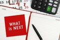 What is Next - concept of text on sticky note. Work and study concept Royalty Free Stock Photo