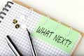 WHAT NEXT on post note for remind on the stickers with pen Royalty Free Stock Photo
