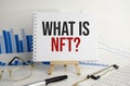 what is nft on notepad with office tools Royalty Free Stock Photo