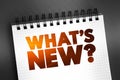 What\'s New question text on notepad, concept background Royalty Free Stock Photo