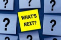 What`s Next - inscription on yellow sticker. Question for Social media, Blog post. A yellow square sticker is the center of among Royalty Free Stock Photo