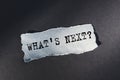 What`s Next, written on an light blue torn note Royalty Free Stock Photo