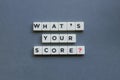 ' What's Your Score? ' word made of square letter word on grey background