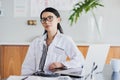 So, what seems to be the issue. Cropped portrait of a young female doctor working in her office in the hospital. Royalty Free Stock Photo