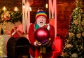 What a surprise. christmas tree decoration. decorate your xmas. new year at home. man decorative ball. happy santa with