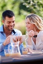 What to do with the rest of today...a young couple using a digital tablet while eating breakfast. Royalty Free Stock Photo