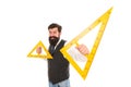 What is triangle. Bearded man hold triangles isolated on white. School teacher smile with geometric triangles. Geometry