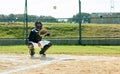 What a well timed catch. Full length shot of a young baseball player waiting to catch a ball during a match on the field Royalty Free Stock Photo