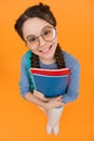 What would you like to read. Happy library reader yellow background. Little girl hold library books. Smart bookworm Royalty Free Stock Photo