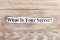 What Is Your Secret text on paper. Word What Is Your Secret on torn paper. Concept Image Royalty Free Stock Photo