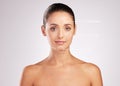 Whatever your skin type youre still beautiful. an attractive young woman with skin types indicated on her face against a