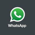 Whatsapp logo on black isolated background.