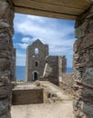 Wheal Coates tin mine,roofless engine house ruins,looking through old doorway,under open skies,Cornwall,England,UK Royalty Free Stock Photo