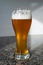 Wheat beer glass with foam