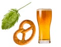 Wheat beer in glass, hop cone and pretzel isolated on white background as detail for Oktoberfest design Royalty Free Stock Photo