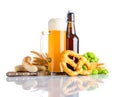 Wheat Beer with Grilled Sausages and Prezel on White Royalty Free Stock Photo