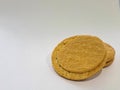 Wheat biscuit sandwich with peanut butter in the center on a white background Royalty Free Stock Photo