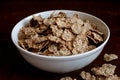 Wheat bran breakfast cereal in bowl. Royalty Free Stock Photo