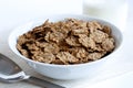 Wheat bran breakfast cereal in bowl. Royalty Free Stock Photo