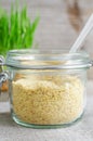 Wheat bran in a glass jar. Wooden background Royalty Free Stock Photo