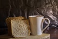 Wheat bread with a glass of coffee. Royalty Free Stock Photo