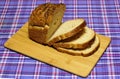 Wheat bread products are on blue tartan Royalty Free Stock Photo