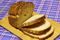 Wheat bread products are on blue tartan Royalty Free Stock Photo