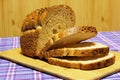 Wheat bread products are on blue tartan Royalty Free Stock Photo