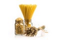 Wheat bunch, macaroni and pasta in jar, isolated on white background. Grain bouquet, golden spikelet.