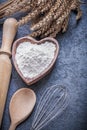 Wheat ears wooden spoon rolling-pin bowl flour egg whisk Royalty Free Stock Photo