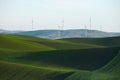 wheat farm hill with wind mill Royalty Free Stock Photo