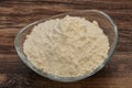 Wheat flour heap in the bowl Royalty Free Stock Photo