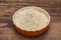 Wheat flour heap in the bowl Royalty Free Stock Photo