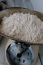 Wheat flour in a traditional balance weight Royalty Free Stock Photo