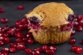 Wheat fresh cupcake with cherry and red pomegranate