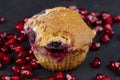Wheat fresh cupcake with cherry and red pomegranate