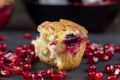 Wheat fresh cupcake with cherry and red pomegranate