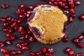 Wheat fresh cupcake with cherry and red pomegranate