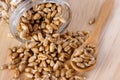 Wheat germ in a glass jar on the wooden background Royalty Free Stock Photo