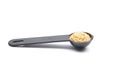 Wheat germs in measuring spoon on white background Royalty Free Stock Photo