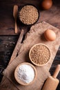 Wheat grain, flour, egg and kitchen utensil for bakery cooking Royalty Free Stock Photo