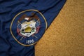 wheat grain on the waving colorful big flag of utah state