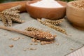 Wheat grains, flour and spikelets on cloth Royalty Free Stock Photo