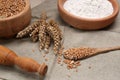 Wheat grains, flour and spikelets on cloth Royalty Free Stock Photo