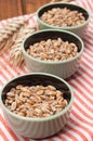 Wheat grains in three bowls Royalty Free Stock Photo