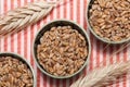 Wheat grains in three bowls Royalty Free Stock Photo