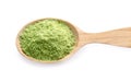 Wheat grass powder in wooden spoon on white background Royalty Free Stock Photo