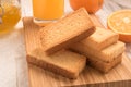 Wheat rusk in a wooden panel with jam.