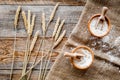 Wheat and rye ear for flour production on wooden desk background top view Royalty Free Stock Photo