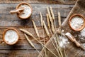 Wheat and rye ear for flour production on wooden desk background top view Royalty Free Stock Photo